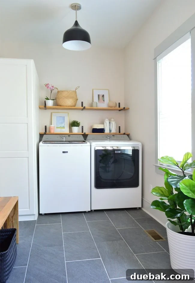 Seamless Malm Dresser Integration 19 Laundry room cabinet storage using an IKEA Pax system, customized for a mudroom