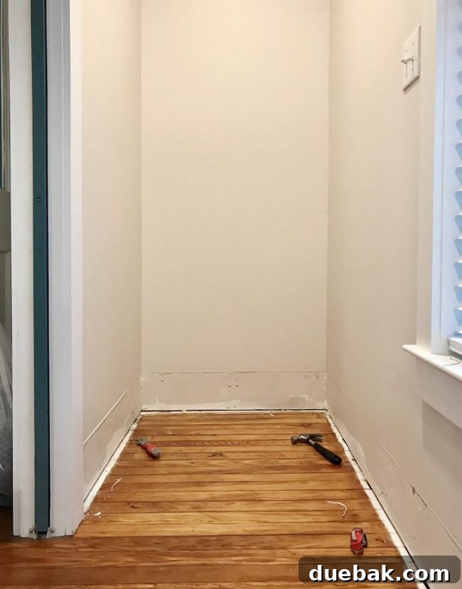 Seamless Malm Dresser Integration 7 Empty nook with baseboard and quarter round removed, ready for the IKEA Malm dresser installation