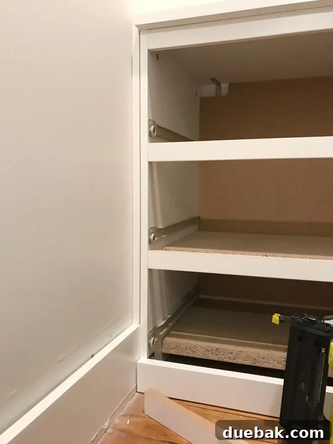 Seamless Malm Dresser Integration 8 IKEA Malm dresser placed in the nook with filler pieces installed on the sides for a built-in appearance