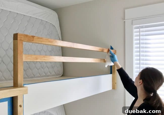 Wood railings in beach house bunk beds, showing matched stain