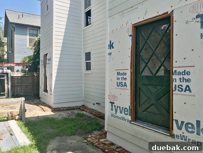 Rendering or plan for a tin awning over the newly hung doors