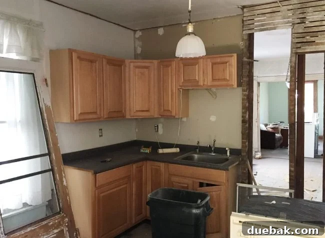 Our Beach House Downstairs: Before and After 30 Previous kitchen area before renovation