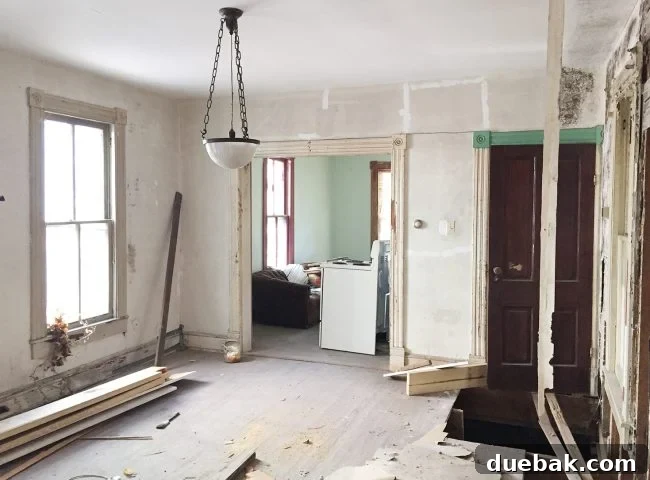 Our Beach House Downstairs: Before and After 32 Dining area before renovation with hole in floor