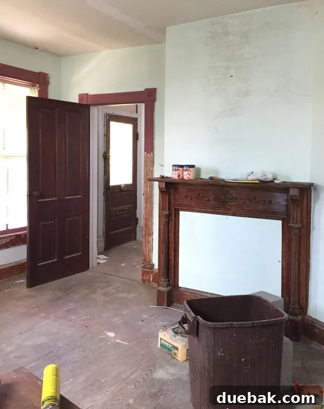 Our Beach House Downstairs: Before and After 36 Living room fireplace before renovation
