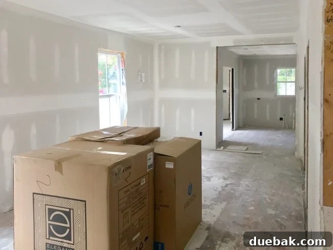 The Duplex Takes Shape Drywall And Video Tour Reveal 7 Drywalled living room with bathroom vanity boxes