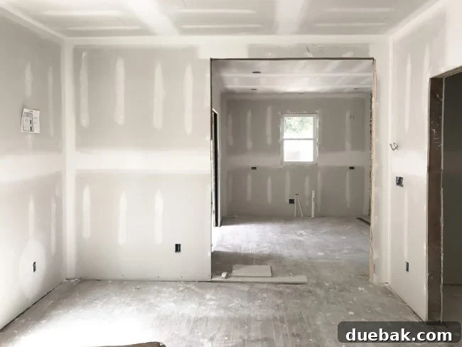The Duplex Takes Shape Drywall And Video Tour Reveal 8 Drywalled kitchen area of the duplex