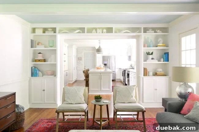 Decluttered built-in bookshelves in a living room, showcasing a more simplified, curated, and cozy minimalist aesthetic with fewer books and objects.