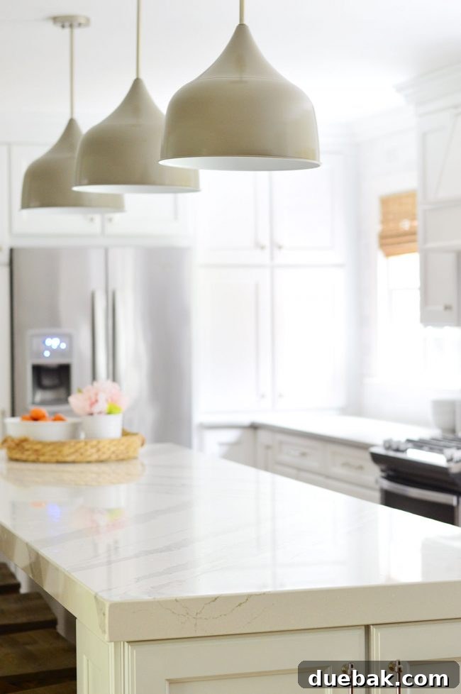 A decluttered kitchen island after applying cozy minimalist principles, featuring fewer items and a more open, functional space.