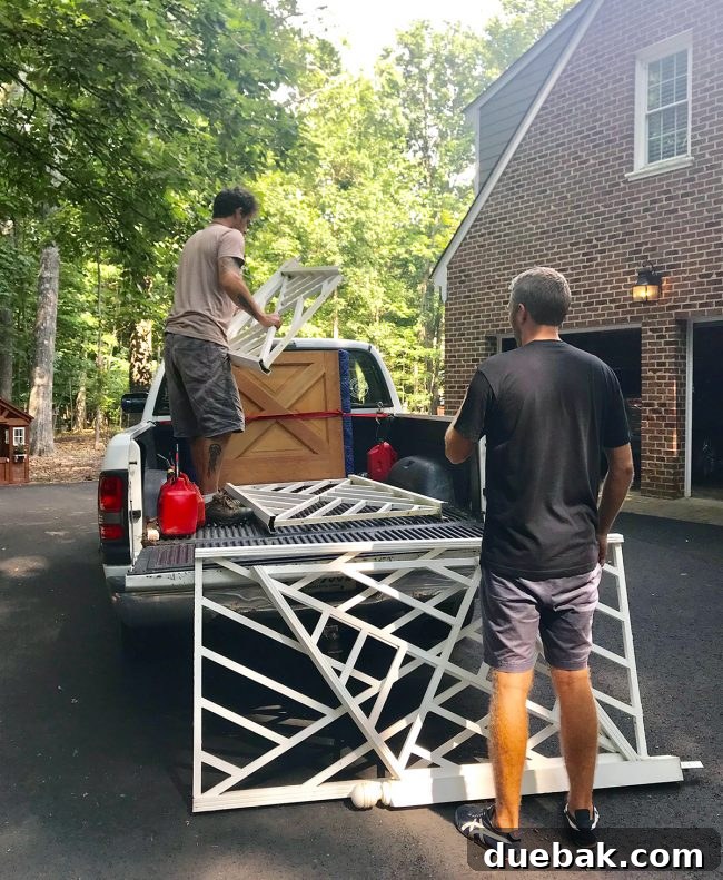 Chippendale style railings being installed as interior stair railings in the duplex, showcasing their new purpose.