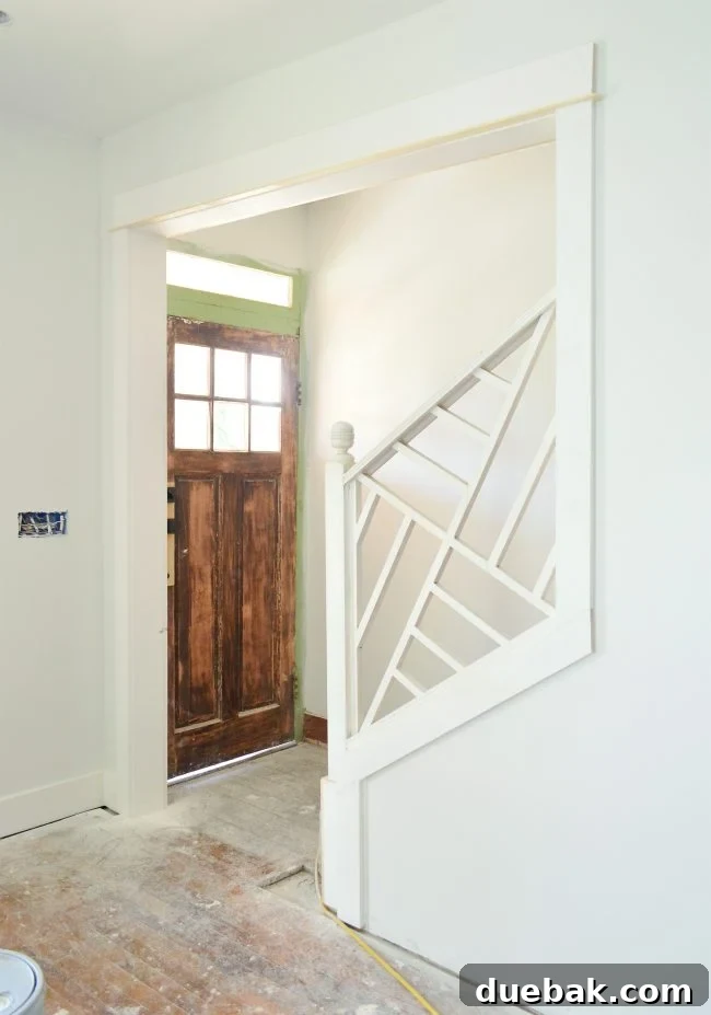 Chippendale railings installed at the bottom of the duplex staircase
