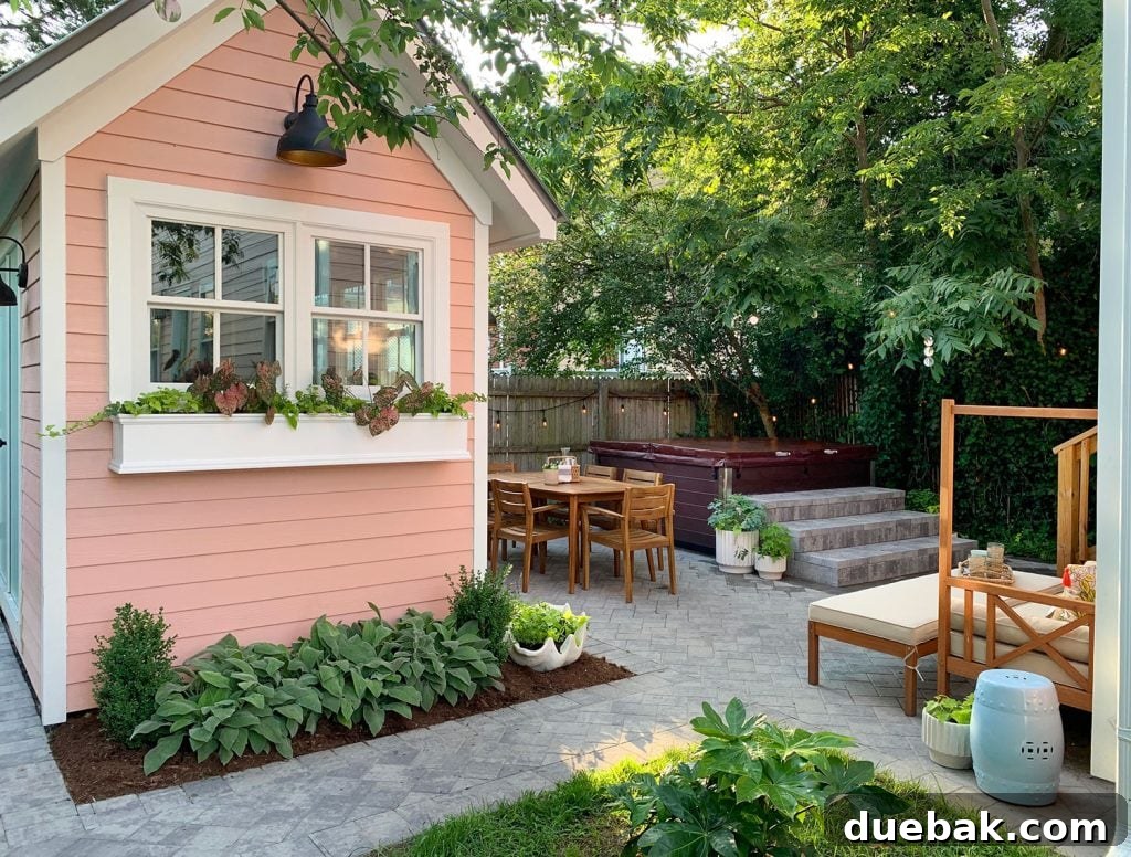Our Beach House Makeover: Upstairs Edition 31 Transformed beach house backyard, now a favorite gathering spot with patio and string lights