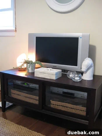 Media Cabinet with Home Accessories and Salt Lamp Cozy Den Decor