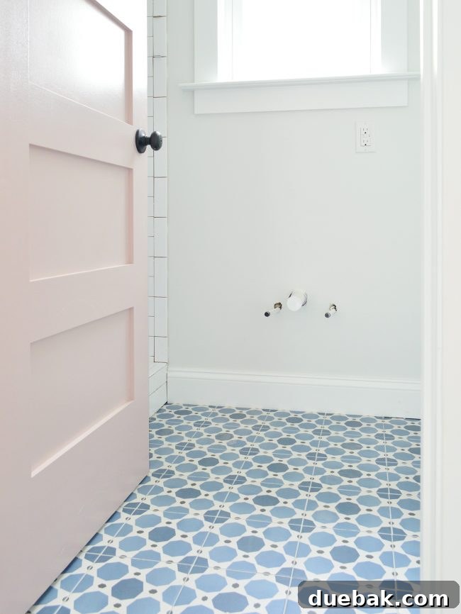 Close-up of a blue and white patterned square floor tile, demonstrating its symmetrical design.