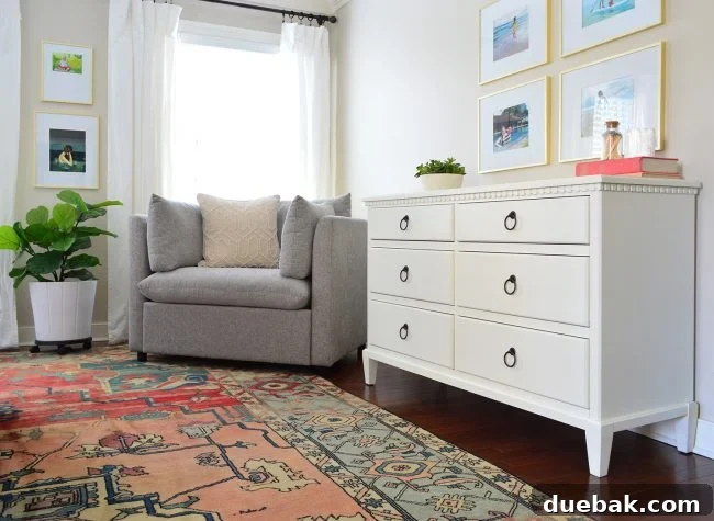 Mellow Armchair and Wisp Dresser in a bedroom, demonstrating functional elegance