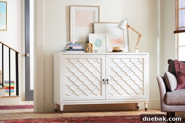 Scalloped Sideboard and Spiffy Armchair enhancing a stylish entryway or living space