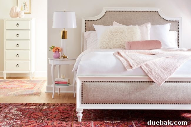 Wisp Chest, Marble End Table, and Swoon Upholstered Bed in a beautifully styled bedroom