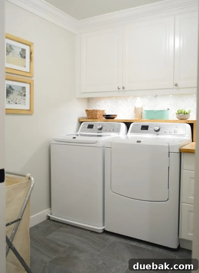 Elevate Your Kitchen Design with Under-Cabinet Lighting 2 A beautifully illuminated laundry room countertop featuring under cabinet lighting, showcasing bright task lighting over the sink and work area.