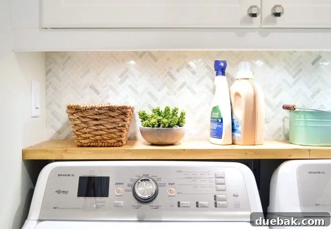 Elevate Your Kitchen Design with Under-Cabinet Lighting 17 A close-up photograph of a sleek, wall-mounted switch specifically installed for convenient and easy control of the under cabinet lighting system.