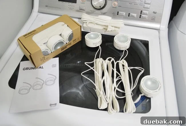 Unlock Your Kitchen's Brilliance 3 IKEA Grundtal under cabinet spotlights before installation