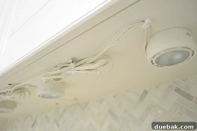 Unlock Your Kitchen's Brilliance 10 Neatly arranged and secured wiring under cabinet