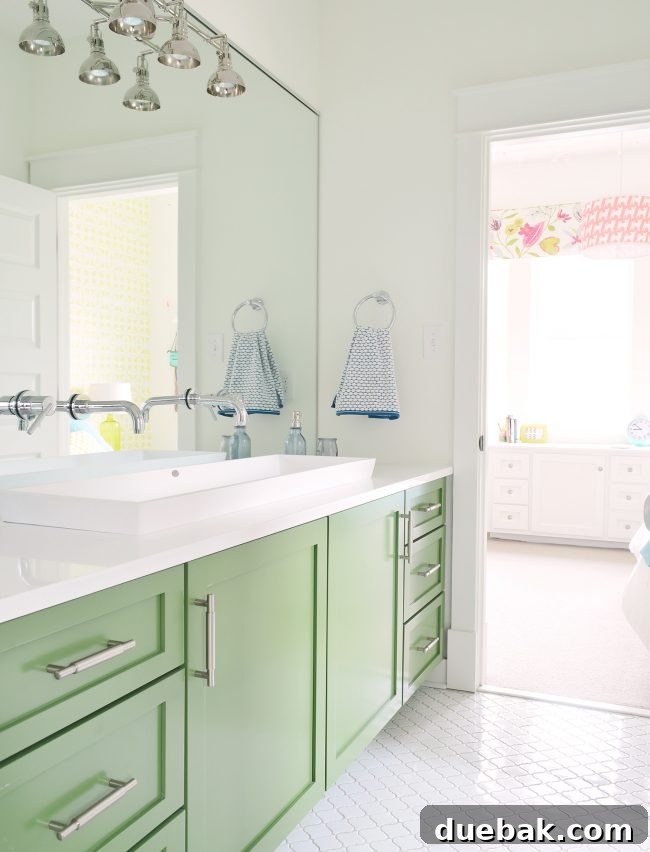 Jack-and-Jill bathroom with green vanity