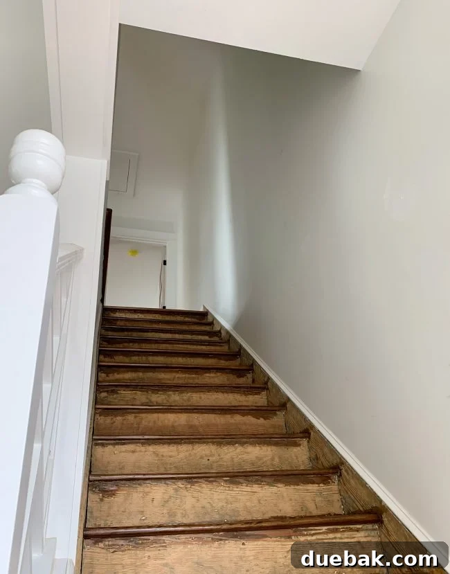 Duplex staircase after renovation with raised ceiling
