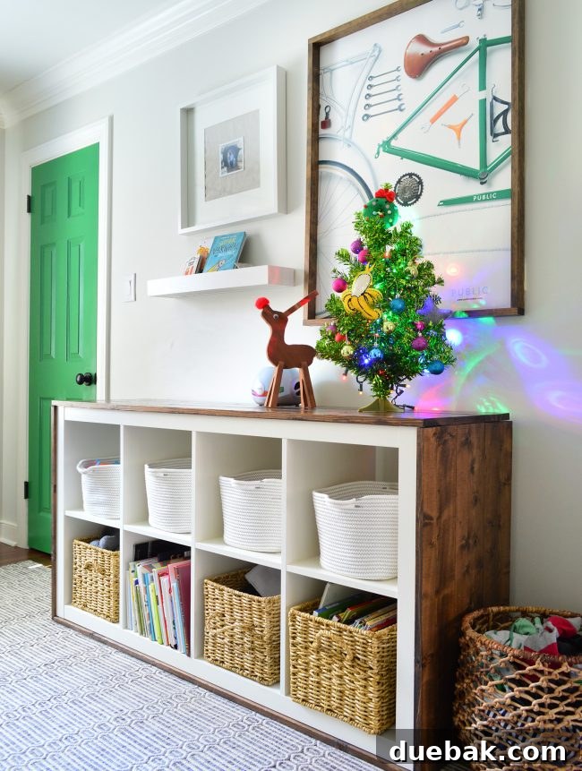 Double the Sparkle: Holiday Decorating at Home and the Beach 12 A retro green tinsel Christmas tree with colorful lights in a child's room.