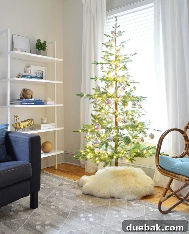 Double the Sparkle: Holiday Decorating at Home and the Beach 16 A sparse 'Charlie Brown Christmas Tree' decorated in a beach house living room.