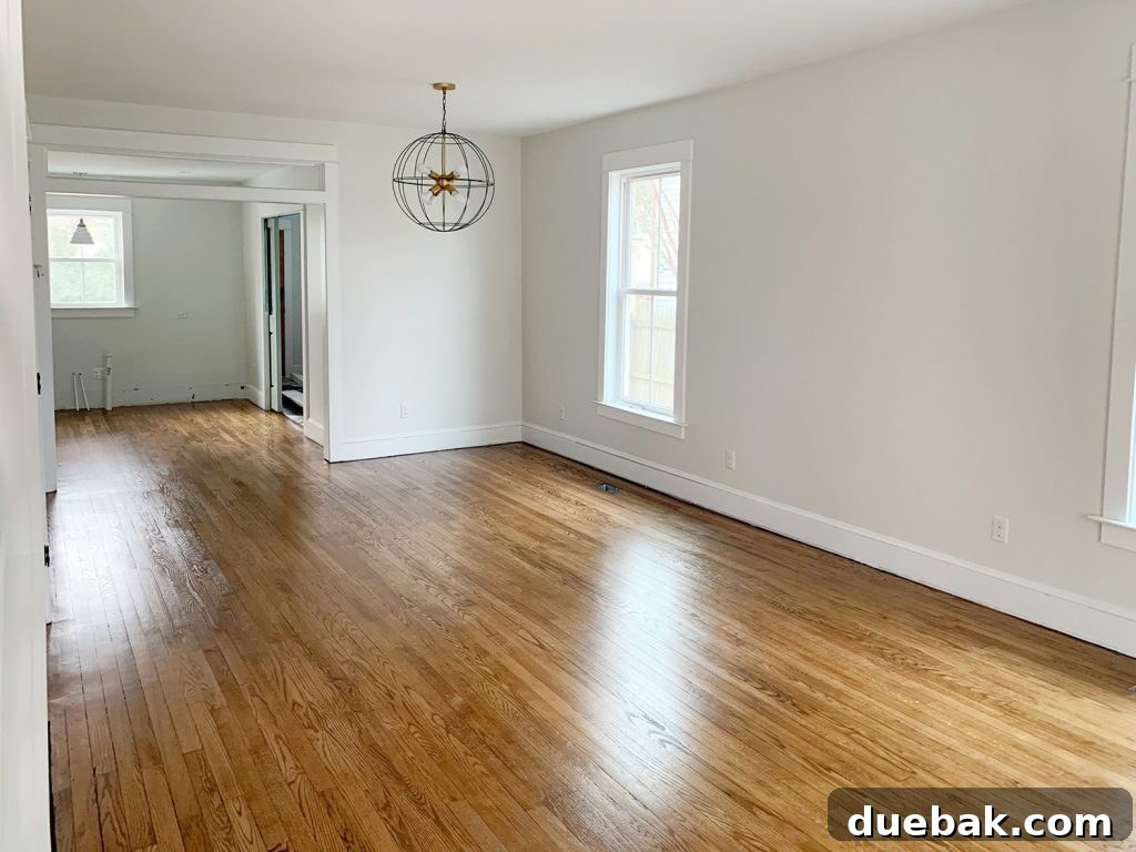 Reviving Oak and Pine Floors 24 After photo of the other side of the duplex living room, revealing beautifully refinished floors.