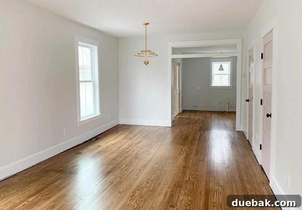 Reviving Oak and Pine Floors 6 Refinished oak floors in the duplex living room, looking polished and new.