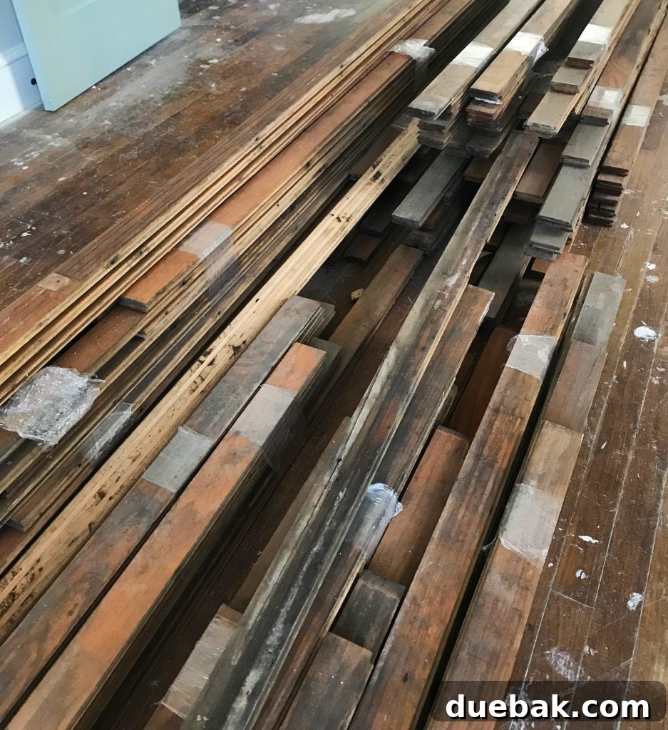 Reviving Oak and Pine Floors 10 Expertly patched flooring with reclaimed 100-year-old oak, filling gaps created by floor plan changes.