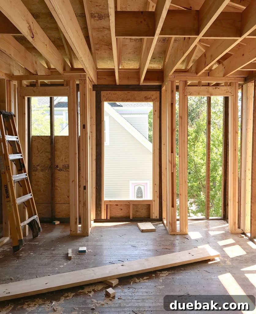 Duplex bedroom with view from the door, showing a chimney nook.