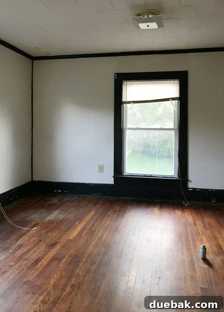 Original state of the duplex bedroom before renovation.