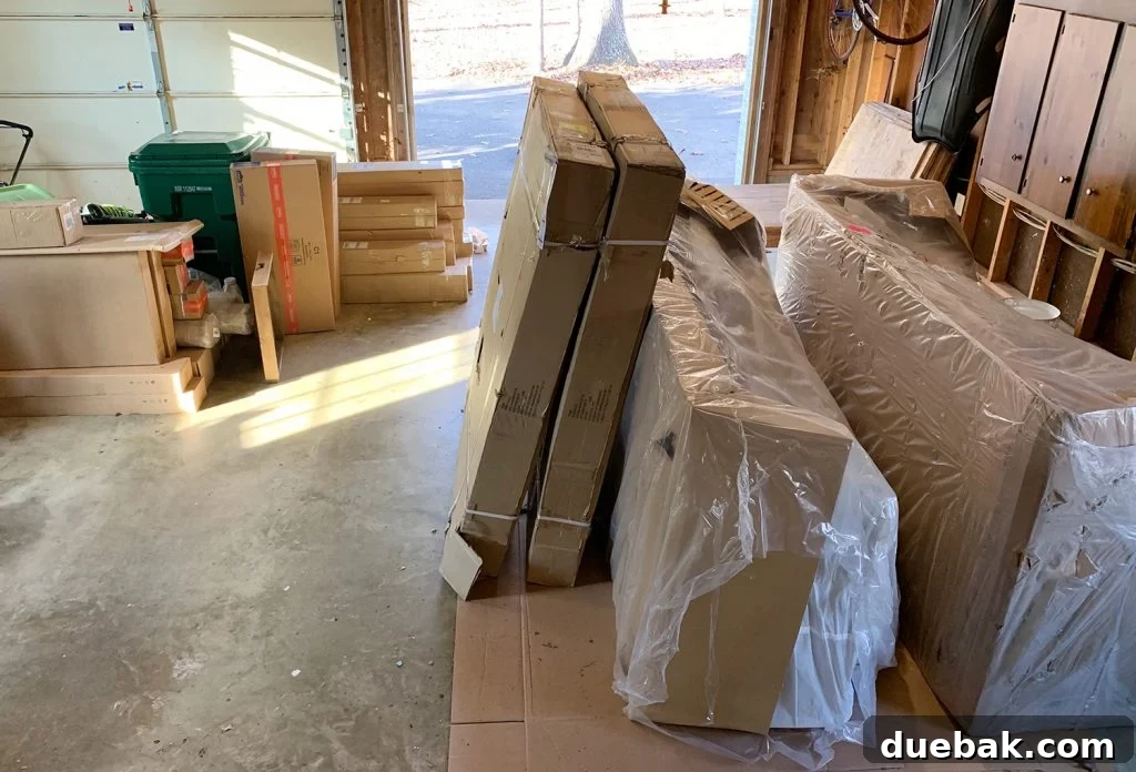 Your Home The Unexpected Mood Killer 2 A garage filled with moving boxes and furniture awaiting transport to a duplex.