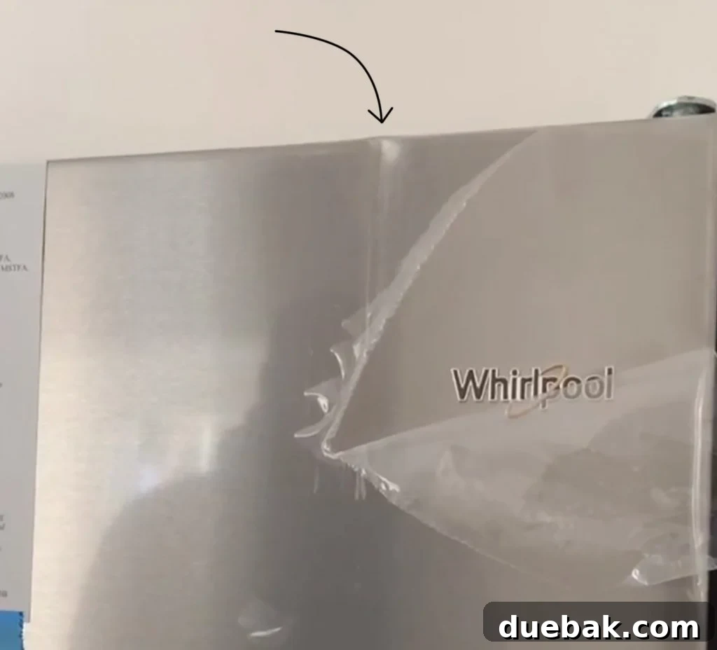 Real Housewives: Airbnb Edition 2 A video screen grab showing a dented refrigerator during a duplex appliance delivery.