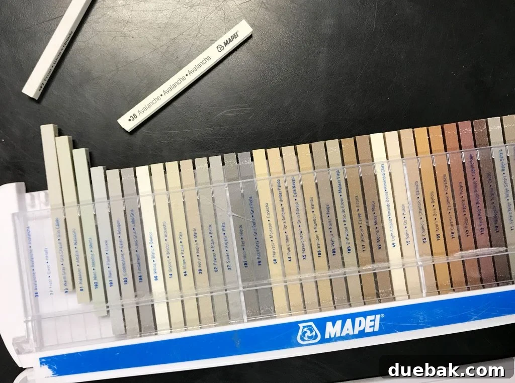 Finding Your Best Grout: Tips for Perfect Color Selection 11 mapei grout color sample sticks at store