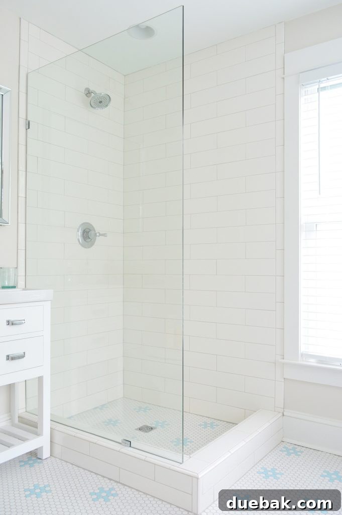Frameless Glass Shower Panel In Subway Tile Bathroom