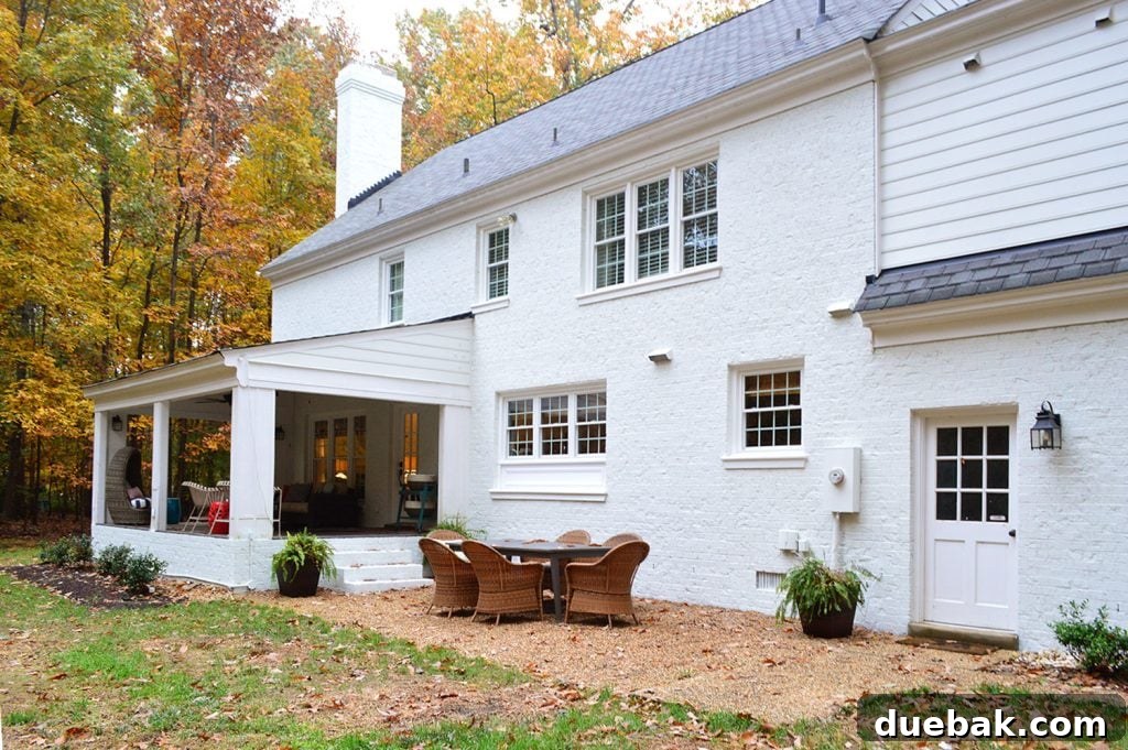 Front Door Facelift: Choosing Paint & Painting Like a Pro 13 House Painted brick from the back showing two exterior doors white before paint