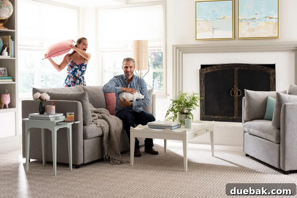 Sherry and John in a photoshoot with their furniture line, showing similarities to the beach house decor.
