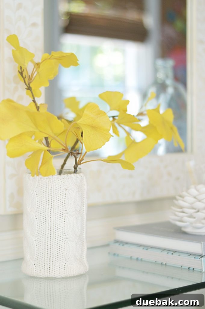 faux gingko leaf branch decor in vase