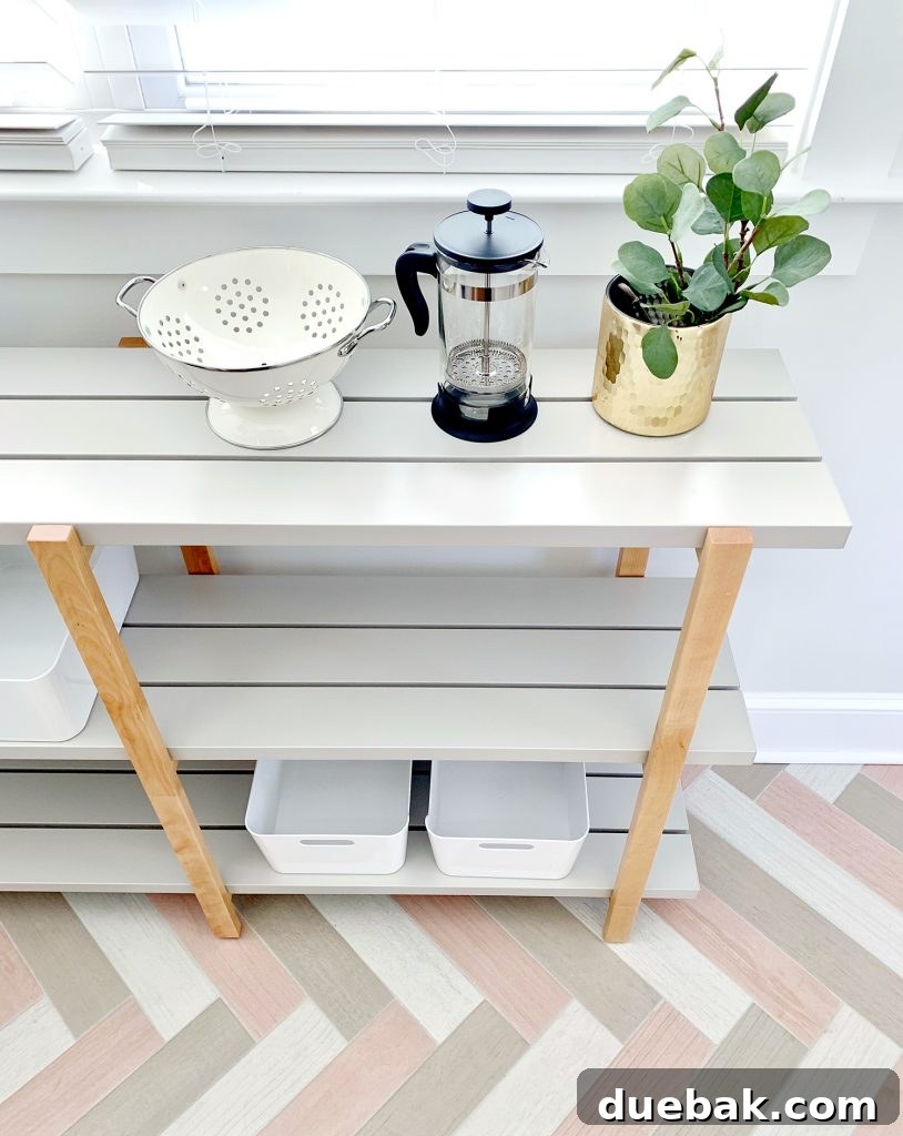 A top-down view of the Ikea Ypperlig open shelving, highlighting the lightweight and durable metal slat construction.