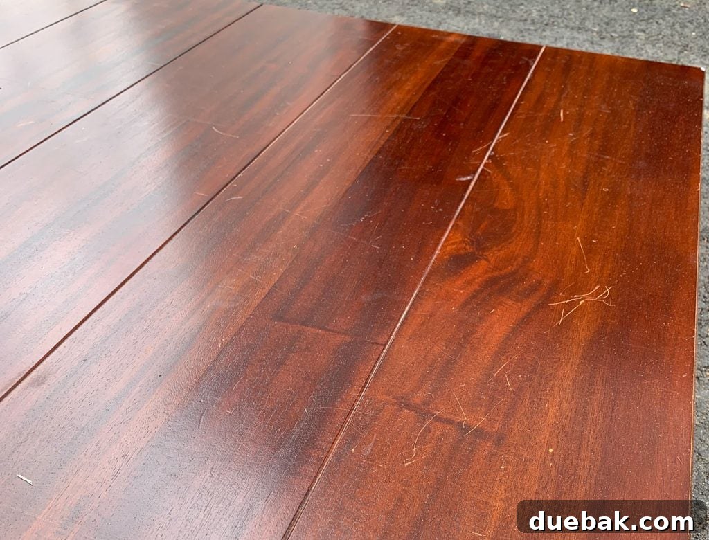 Give Your Table a Stunning New Life 18 Before Photo of Red Damaged Dining Table Stain