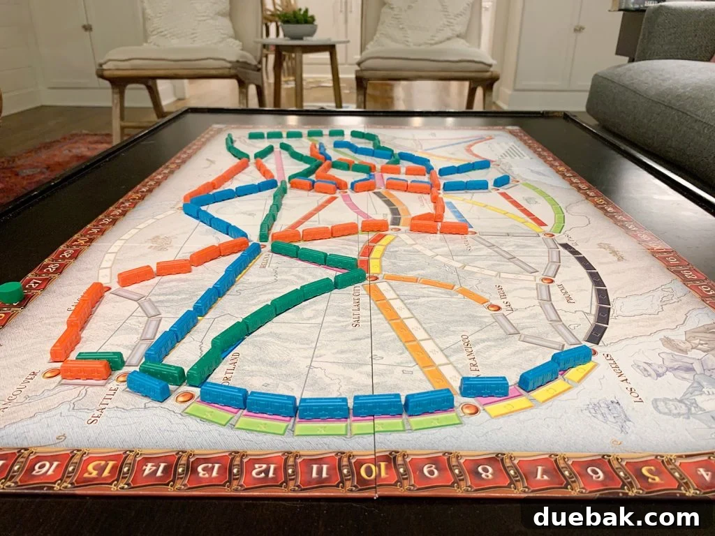 Dollhouse Overload: Finding the Tipping Point 9 The 'Ticket to Ride' board game box and components laid out on a table, ready for play.