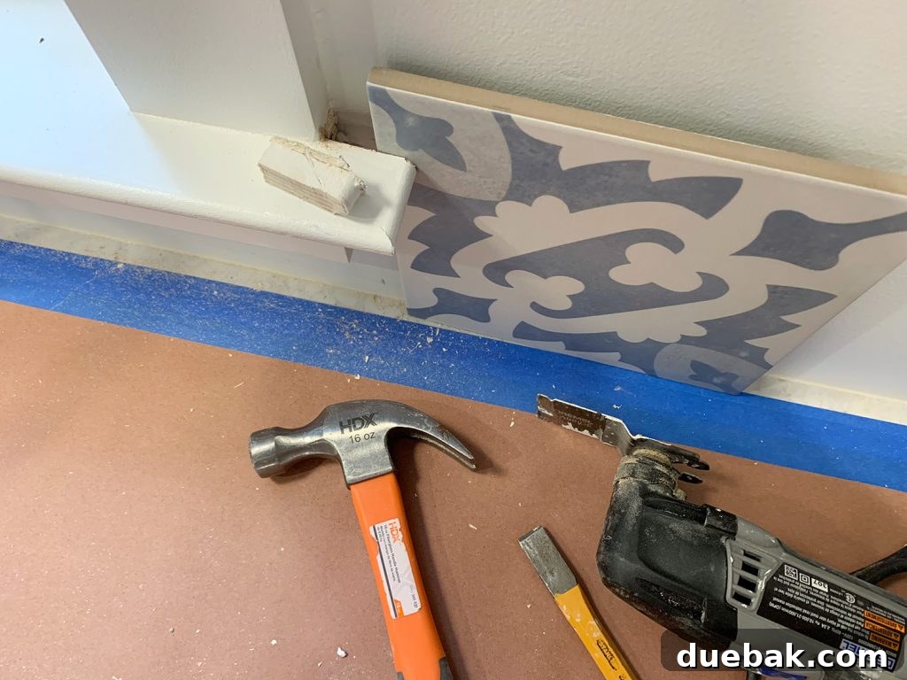 Window Trim Expertly Cut So That Backsplash Tile Can Slide Behind It