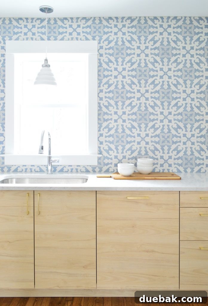 Close-up of Wood Ikea Cabinets with Blue Patterned Backsplash Tile from Tile Bar