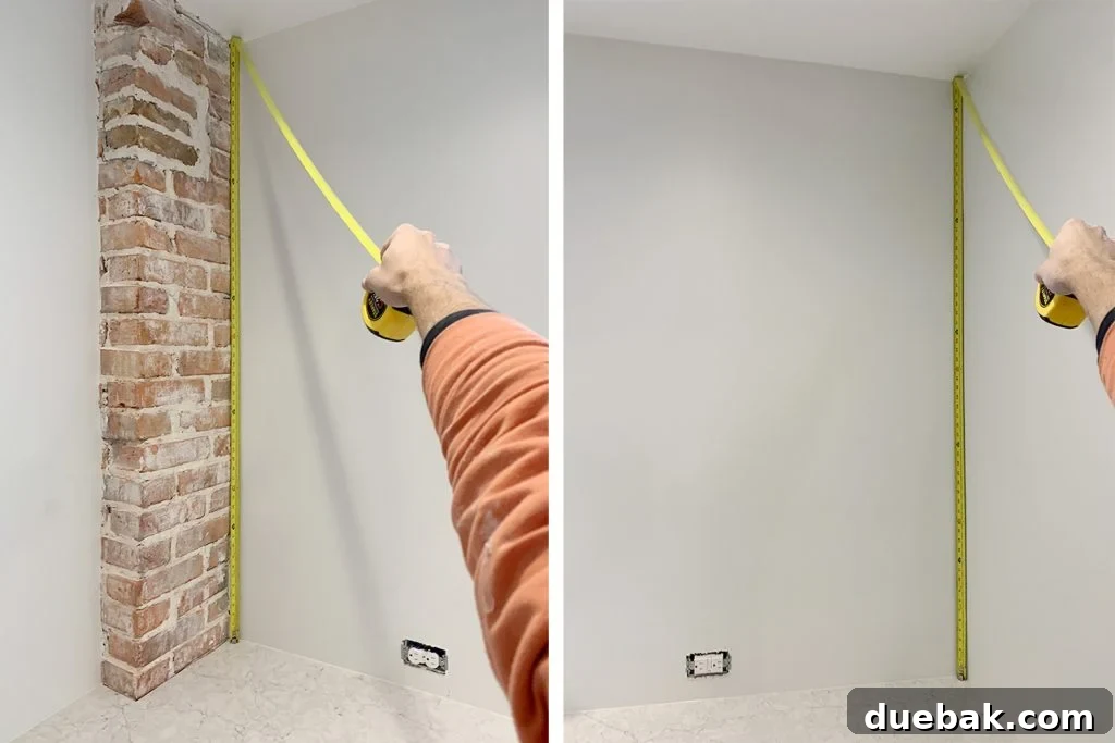 Measuring Wall Heights with a Tape Measure to Prep for Backsplash Tile Installation