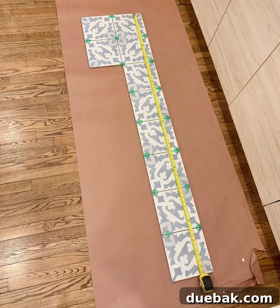 Backsplash Tile Laid Out on Floor to Determine Length and Pattern Placement