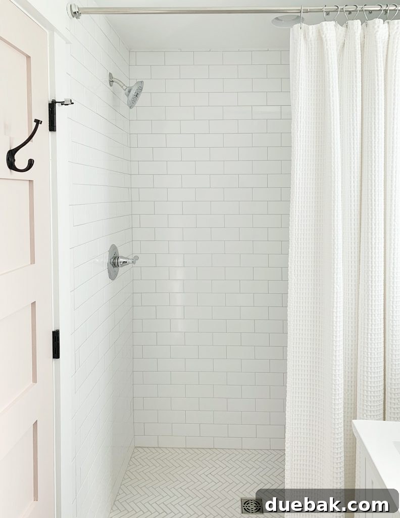Elevating Our Airbnb Bedroom and Bathroom Updates 15 Duplex En-Suite Bathroom Shower with Mixed Metals