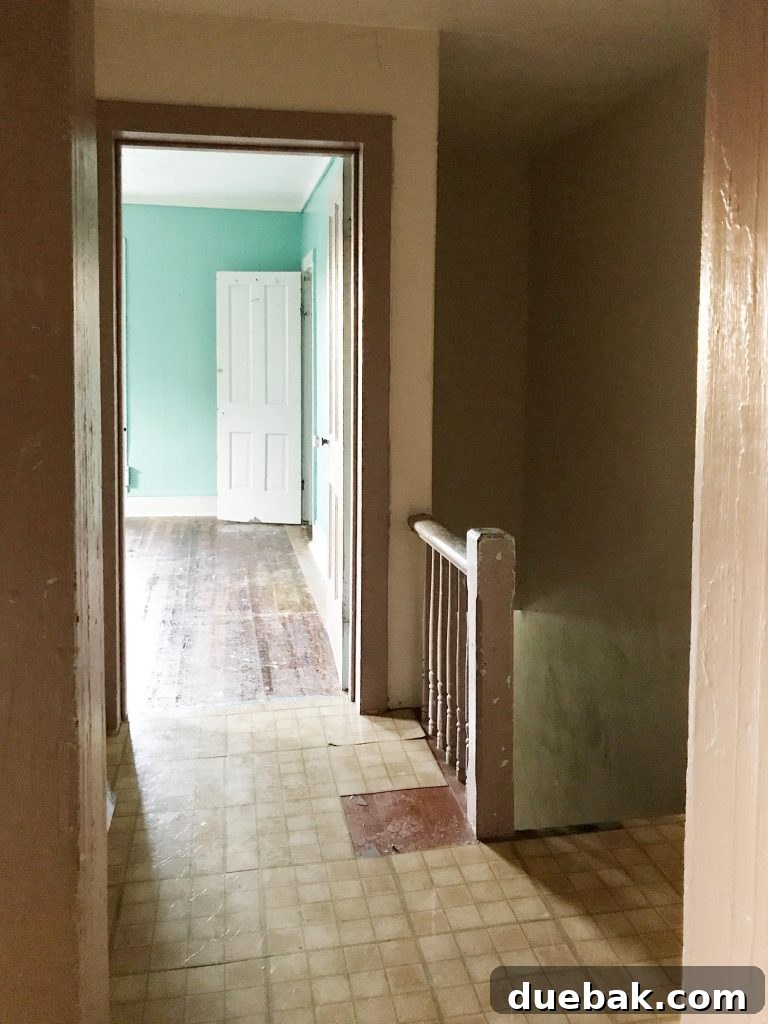 Elevating Our Airbnb Bedroom and Bathroom Updates 19 Duplex Staircase Before Renovation - Dark and Enclosed