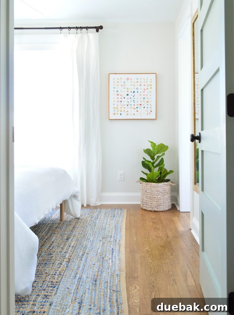 Elevating Our Airbnb Bedroom and Bathroom Updates 24 Duplex Right-Side Front Bedroom with Wooden Bed and Nightstands